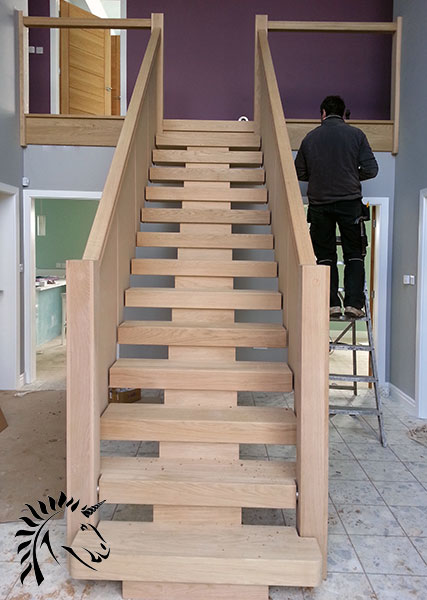 Central feature staircase in oak