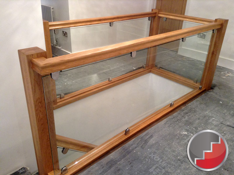 Glass Landing Balustrade with Oak Handrail