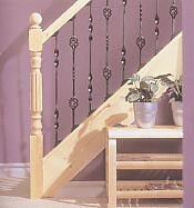 Staircase with metal balusters