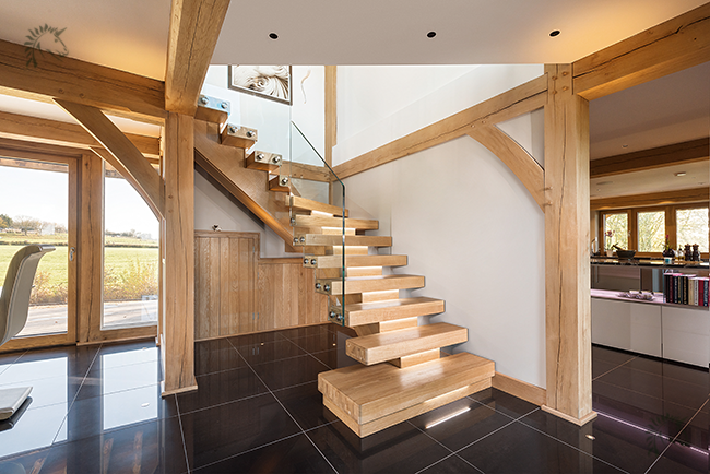 frameless glass balustrade on a oak x vision staircase