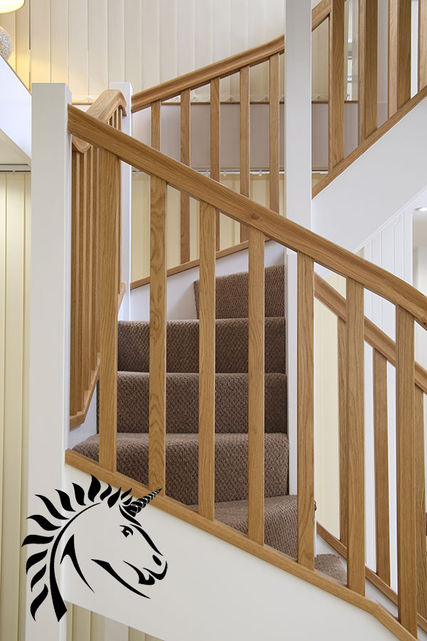 Staircases in oak and white can still offer a striking look over a simple painted stairway