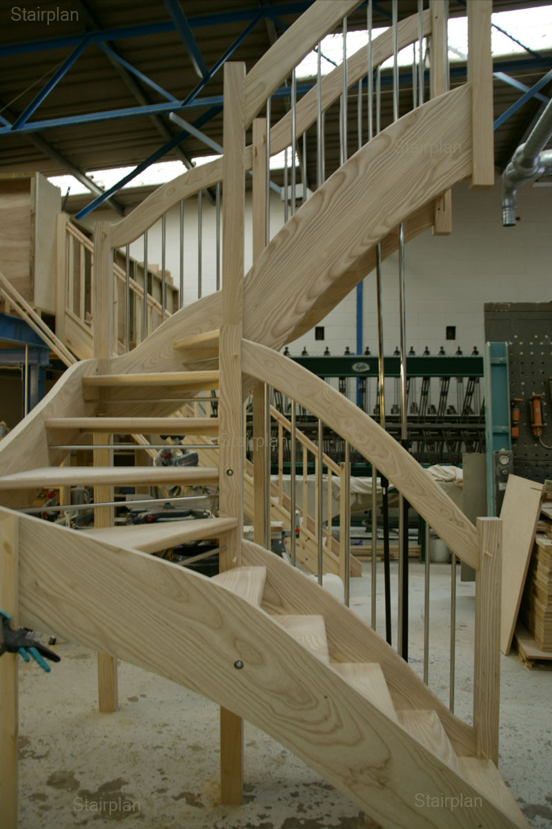 Openplan Double winder staircase in a ash hardwood