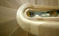 Wreathed Geometrical circular rising handrail and strings