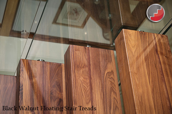 Walnut floating staircase treads