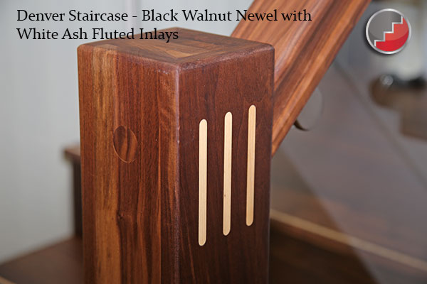 black walnute newel post with contrasting white ash inlays
