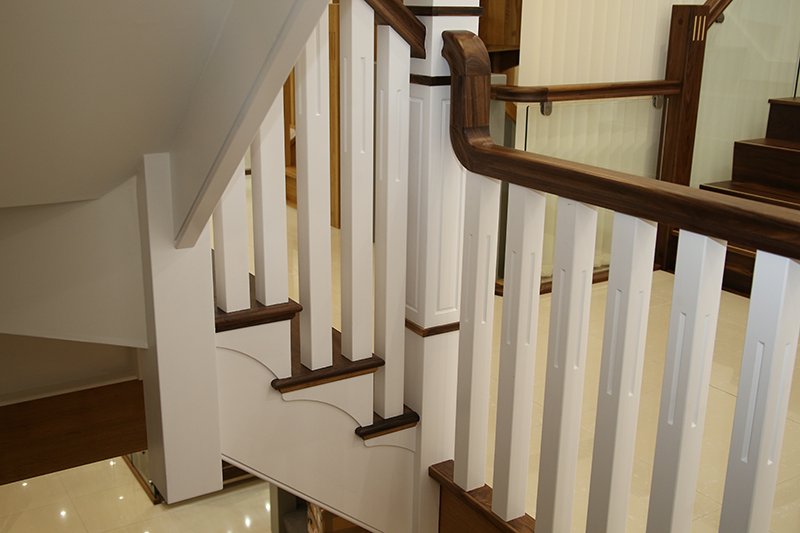 new england cut string staircase walnut treads with white