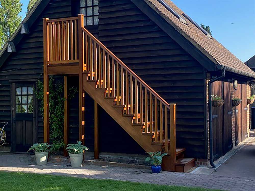 Iroko hardwood external staircase manufactured by Stairplan