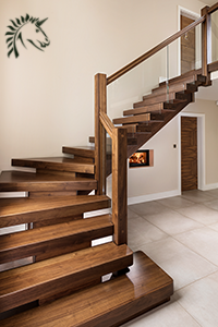 Black Walnut x-vision-staircase design with glass