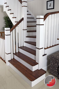 The New England Staircase the cut string design with Black walnut treads and handrail