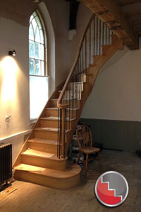 Oak curved stairs bespoke to requirments