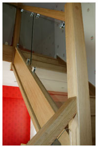 Vision Glass Balustrading oak handrails glass panels dtainless steel d clamps