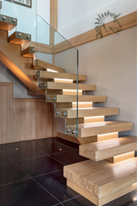 oak X-Vision staircase with frameless glass balustrade
