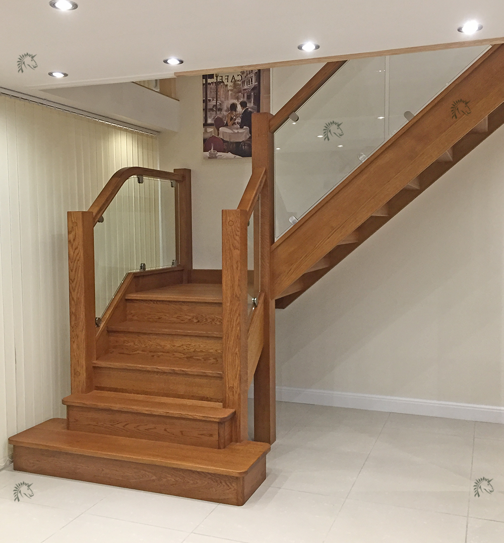 preston oak saircase with medium oak stain and vsion glass balustrade