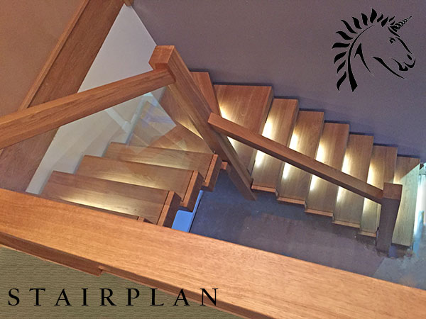 Oak X-Vision staircase with LED lights and the glass is set into the treads