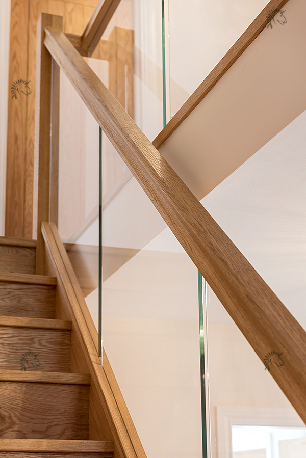 preston oak staircase with recessed glass balustrade
