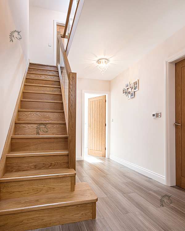 Preston staircase with solid oak treads and risers with glass infill