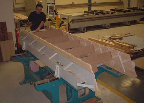 A budget Spacesaver being assembled in the factory