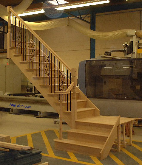 Oak Cut String Staircase with Bespoke Metal Balustrades