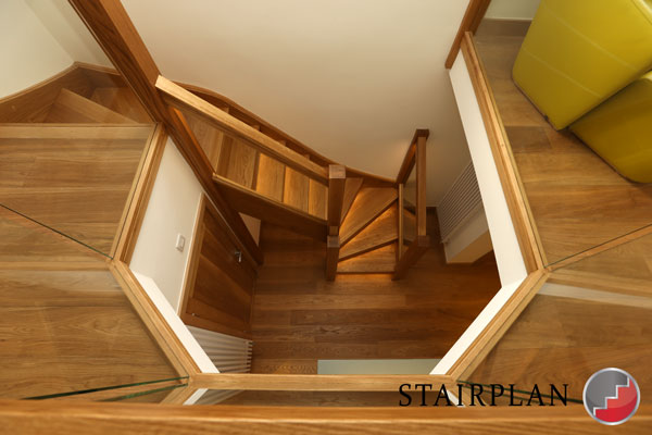 oak staircases with glass balustrade panels and led lighting