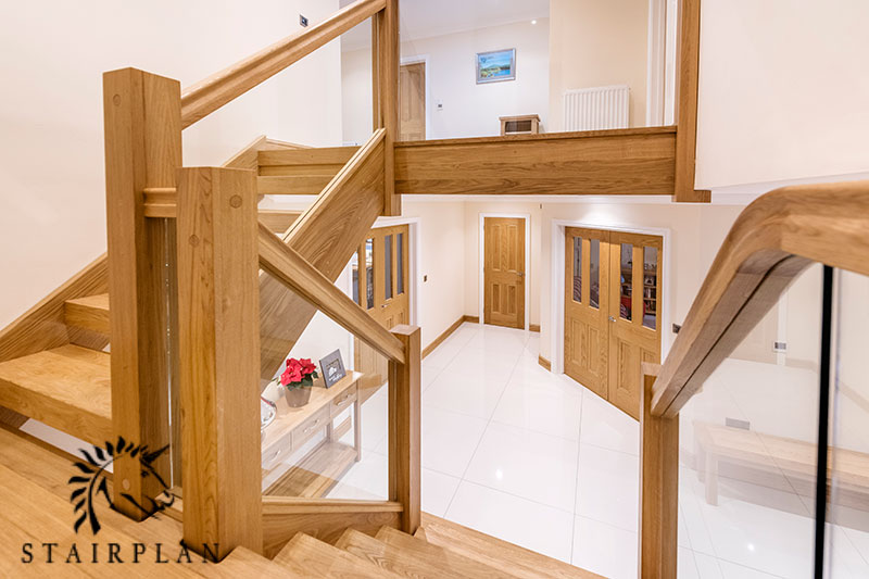 oak townsned staircases with 120mm newel posts and embedded glass