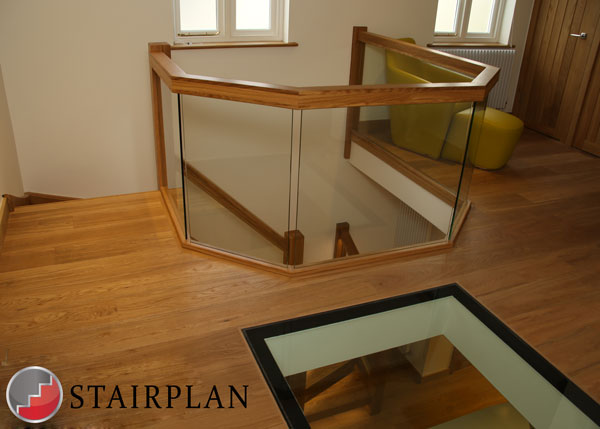 first floor landing balustrade in oak and glass