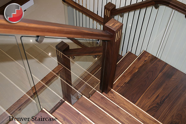 The Denver Staircase design with black walnut sloping risers