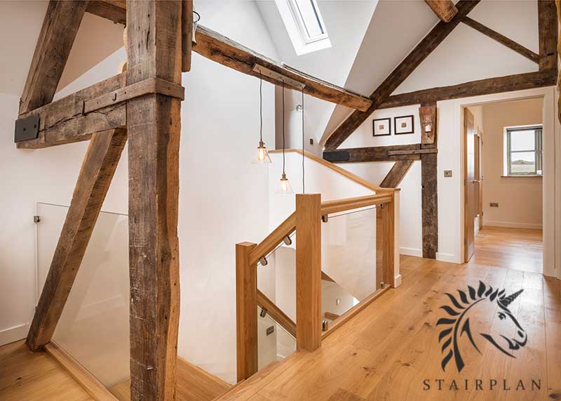 Landing balustrade in Oak with Glass in Barn Conversion