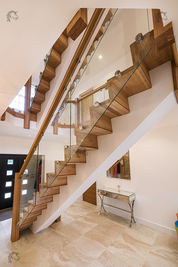 grand hallway feature staircases oak and glass